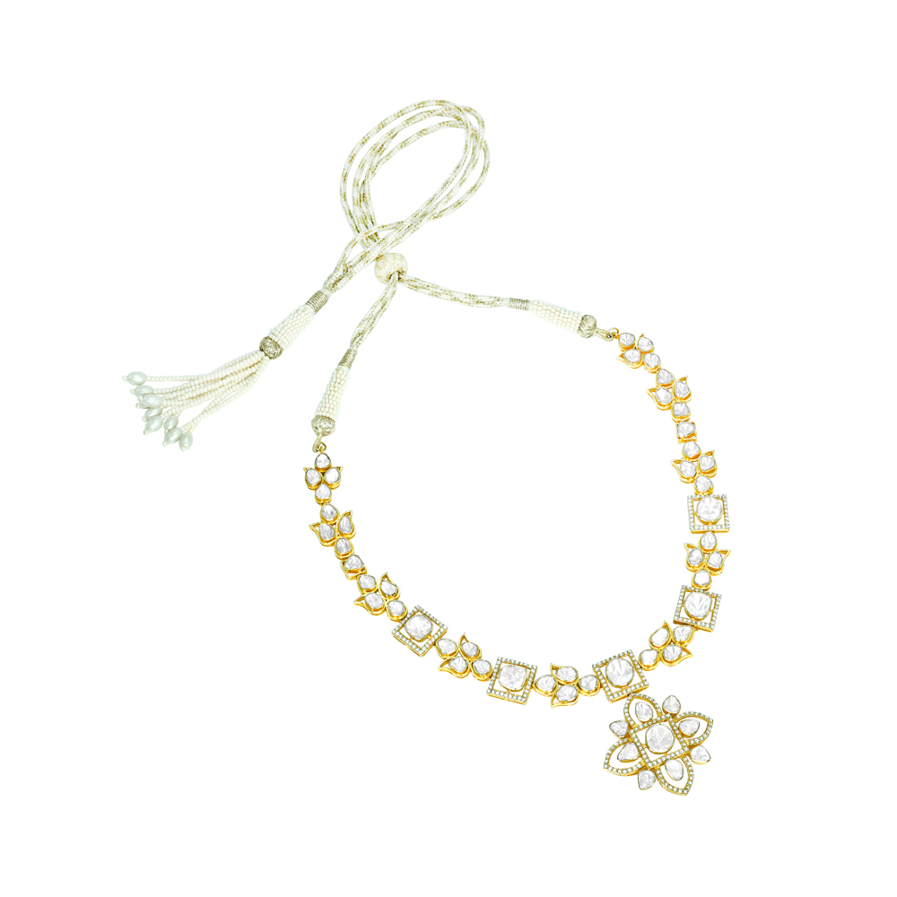 Polki Necklace with Floral Motifs and Lotus-Inspired Pendant